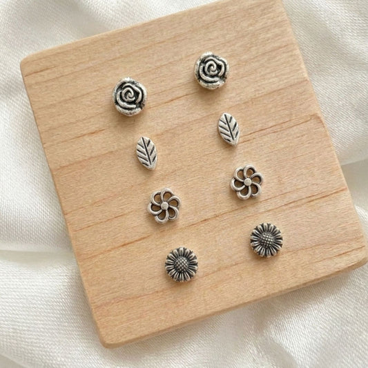 Floral stud earring set — sterling silver | 4 pairs | rose, leaf, flower & sunflower