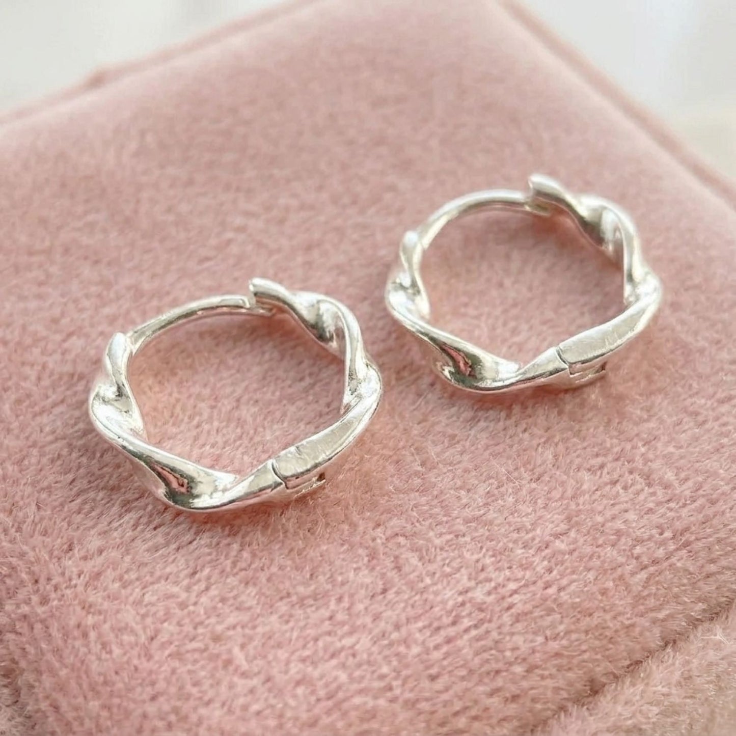 Twisted huggie hoop earrings — sterling silver, 16mm
