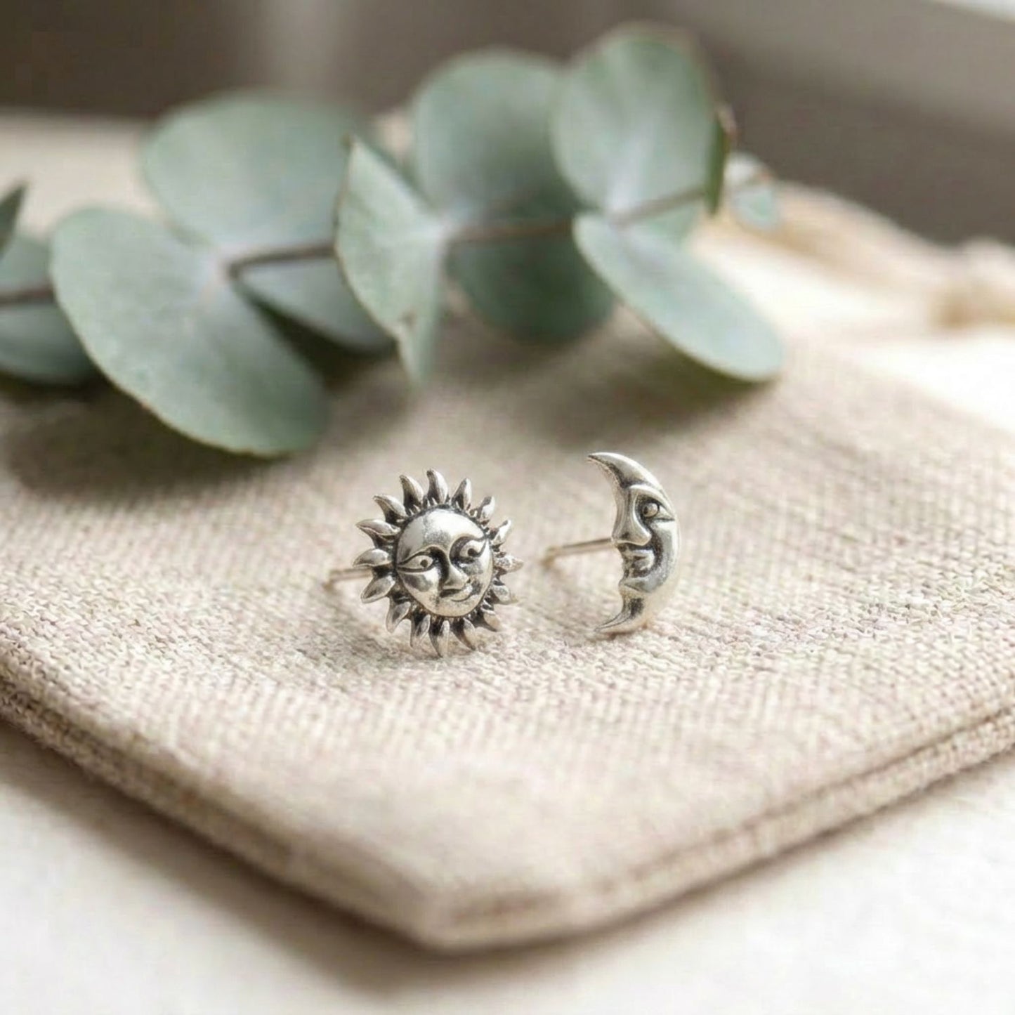 Sun and moon face stud earrings — sterling silver, mismatched pair